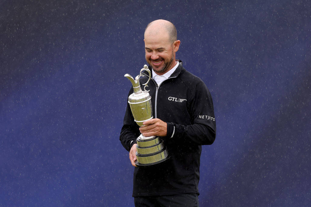 Brian Harman celebrates with the Claret Jug